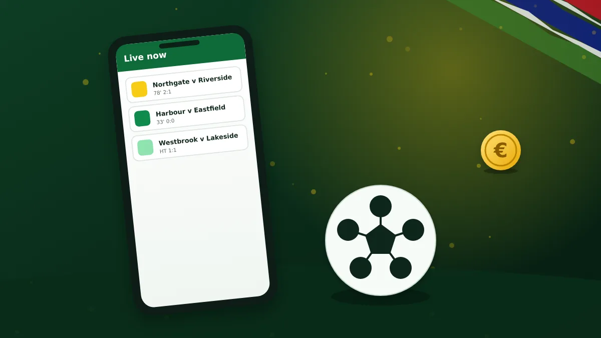 Phone listing live matches next to a football